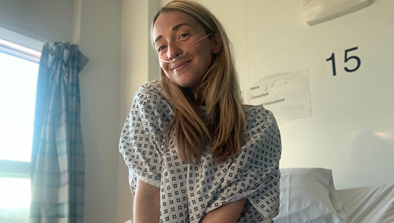 relieved-woman-in-hospital-gown-waiting-for-procedure-Aoifes-Journey